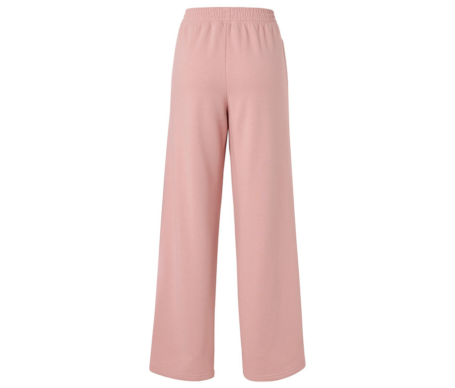 Rosa, weite Hose mit Gummizug, isoliert auf weißem Hintergrund.