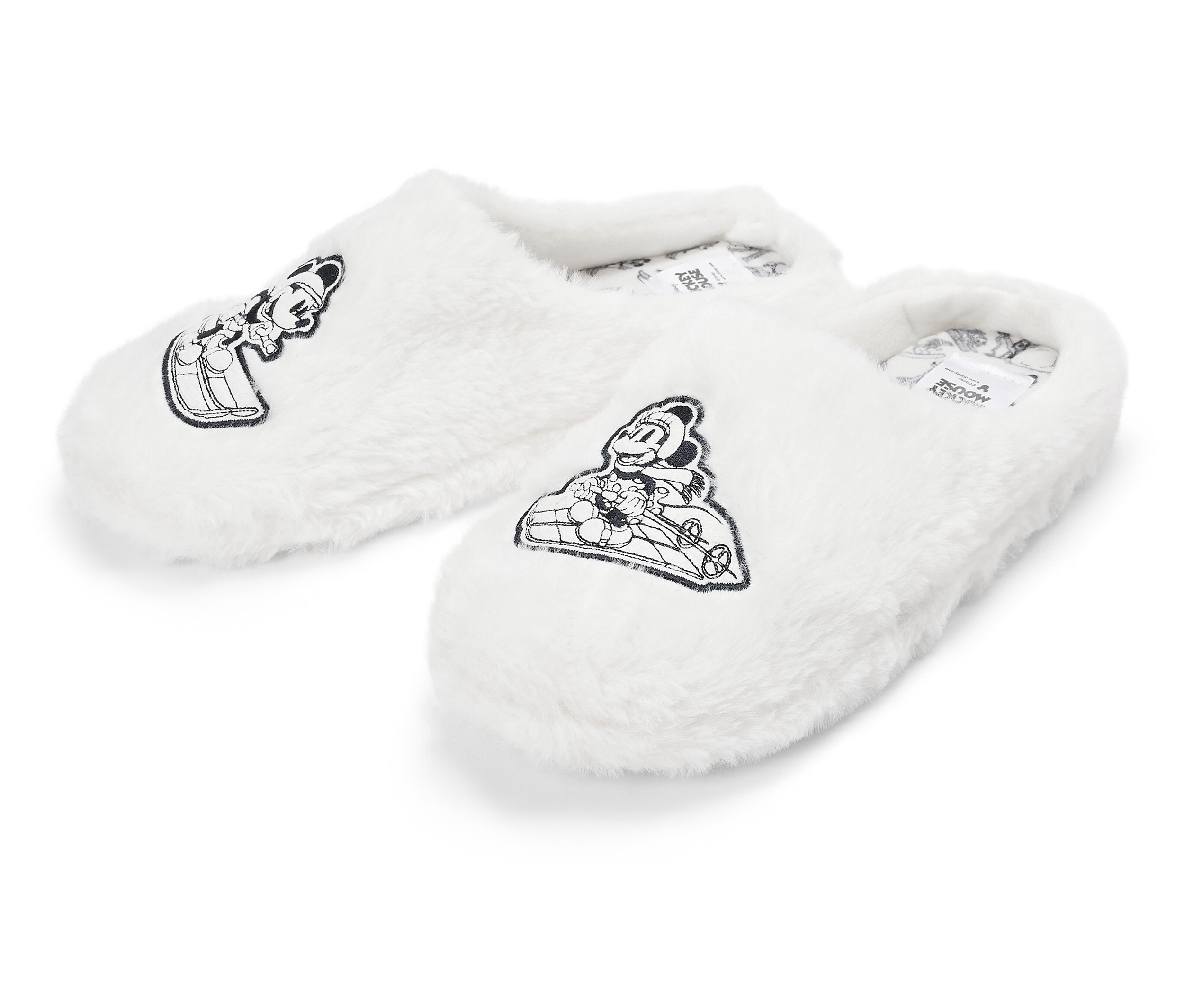 Zwei weiße, flauschige Hausschuhe mit Cartoon-Motiv.