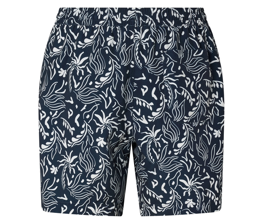 Nahaufnahme von marineblauen Shorts mit weißem Blätterdruck.