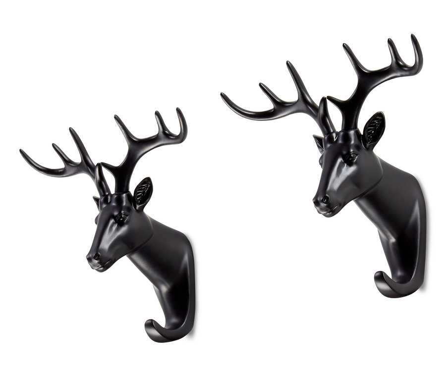 Zwei schwarze Wandhaken in Form eines Hirschkopfes.