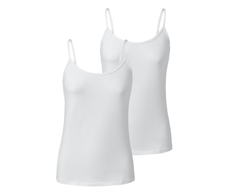 Zwei weiße 2 Hemdchen liegen übereinander.