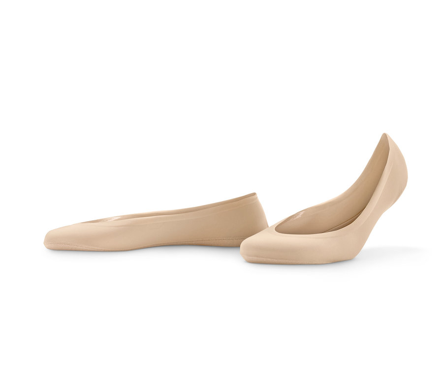 Zwei Paar beige und schwarze Magic-Cut-Füßlinge.