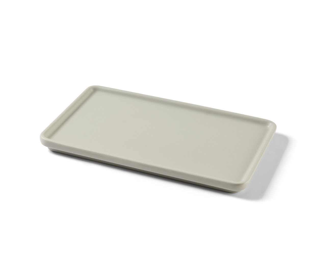 Rechteckiges Keramik-Tablett in Creme.