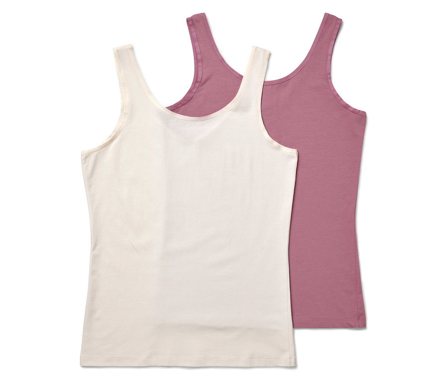 Zwei Tanktops liegen übereinander, eines ist cremefarben und das andere lila.