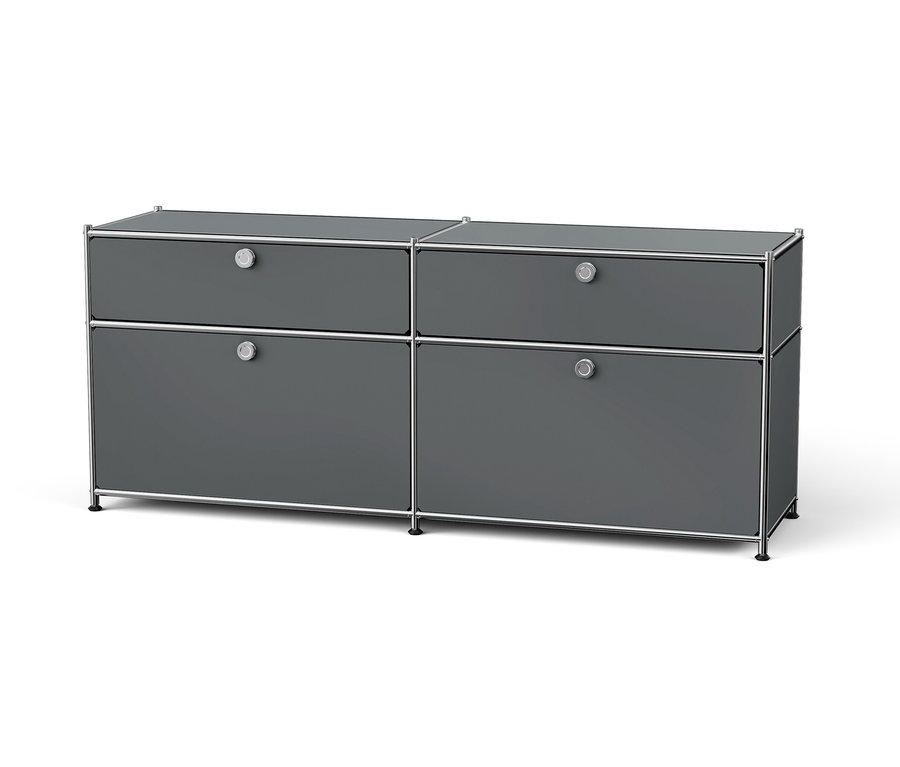 Graue Kommode mit vier Schubladen und Chromrahmen.