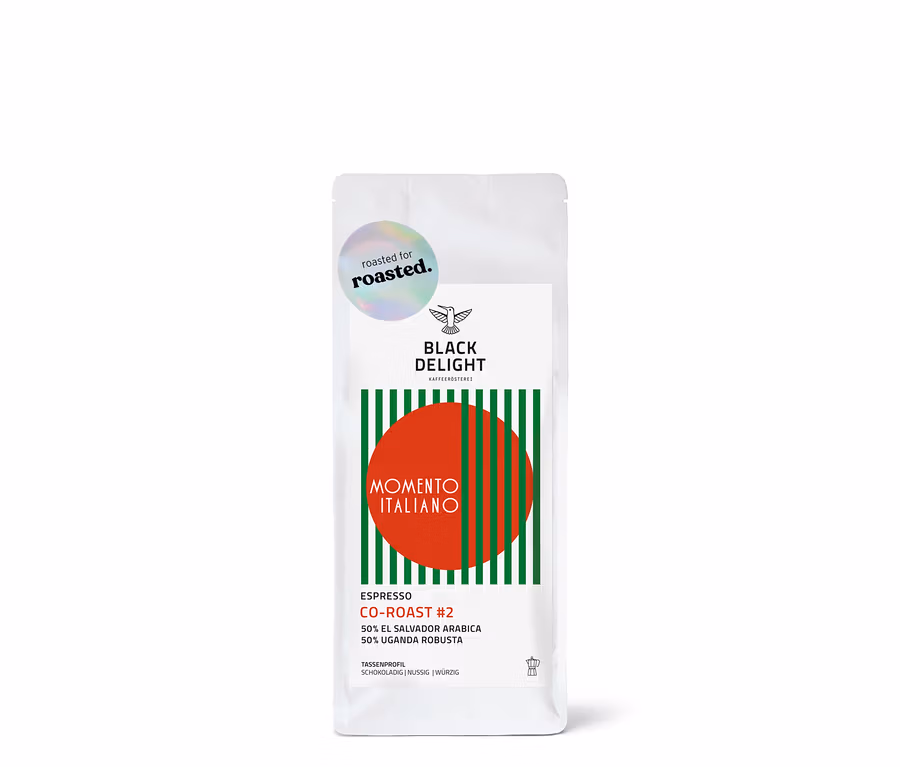 Eine 250-g-Packung gemahlener Black Delight x roasted. - Momento Italiano Co-Roast #2 Espresso.