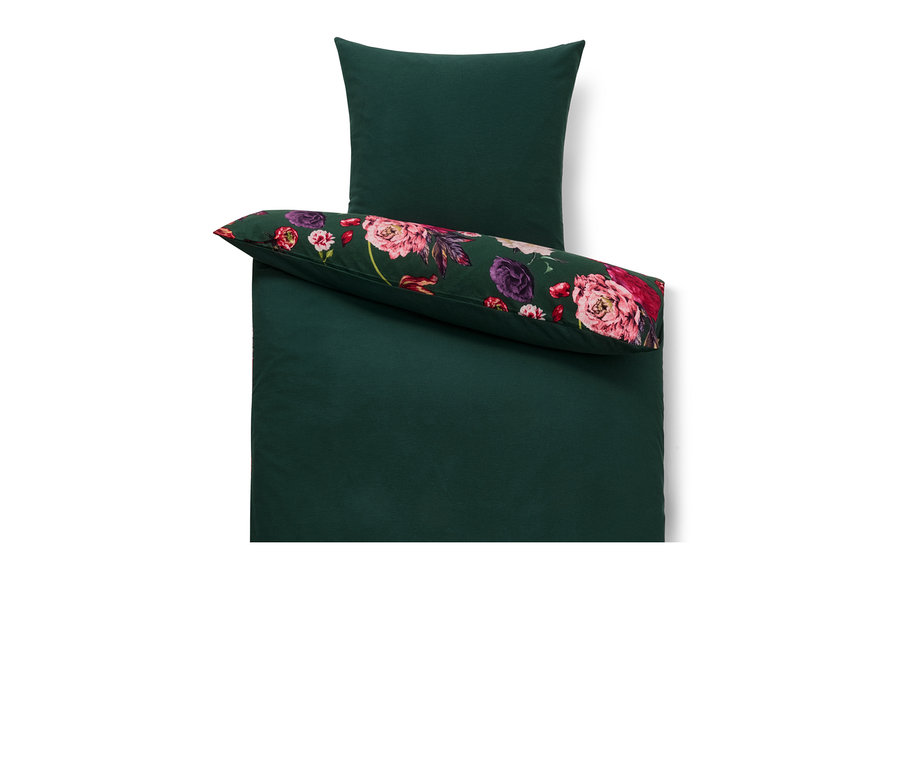 Grüne Biber-Bettwäsche: Bettbezug und Kopfkissen, wobei das Kopfkissen ein florales Muster aufweist.