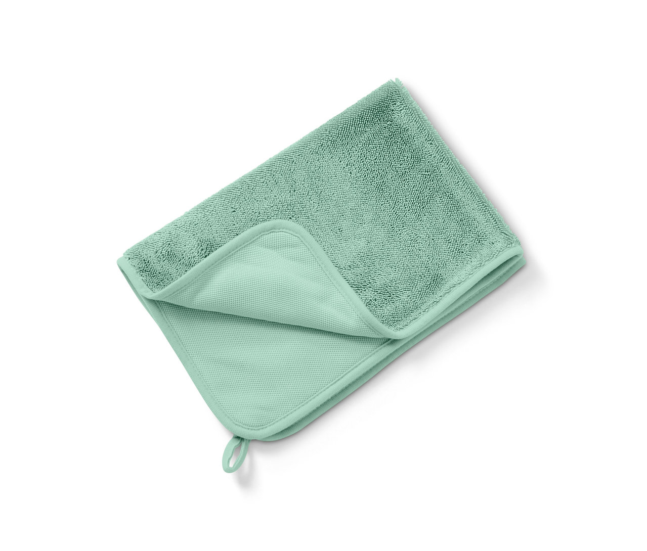 Ein gefaltetes, grünes, saugstarkes Trockentuch liegt auf einem weißen Hintergrund.