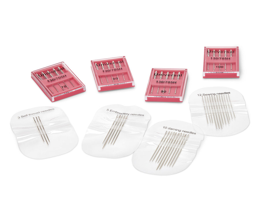 Nähmaschinen- und Nähnadelset: verschiedene Nadeln in Verpackungen und Etuis.