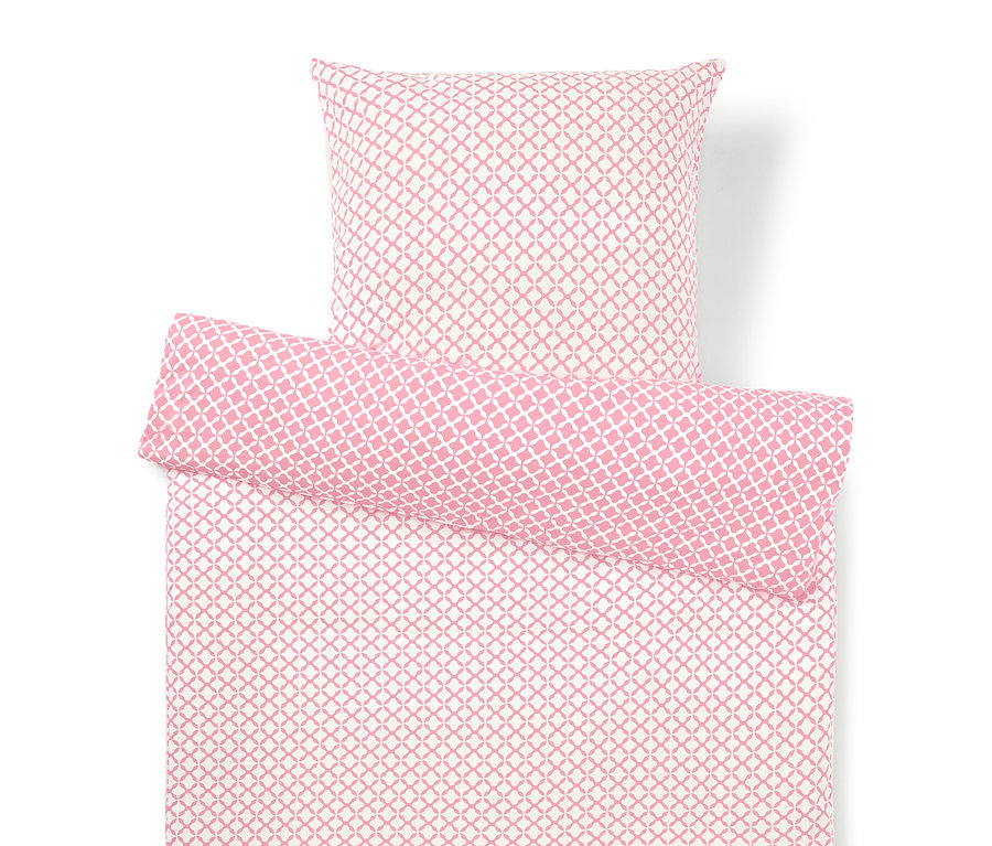 Bettwäsche-Set mit geometrischem Muster in Rosa und Weiß, bestehend aus einem Kissenbezug, einer Bettdecke und einem schmalen Kissen.