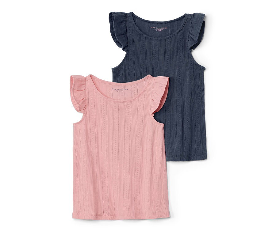 Zwei Kinder-Shirts mit Ajourmuster liegen übereinander.