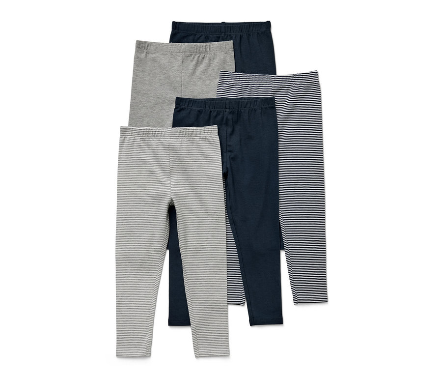 Fünf Kinder-Leggings in verschiedenen Farben und Mustern.
