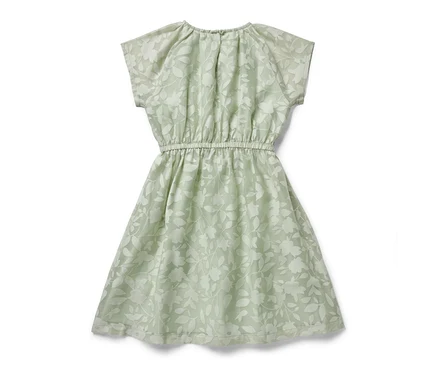 Grünes Kinder-Kleid mit Blumenmuster.