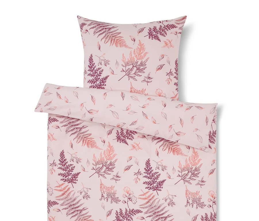 Rosa Bettwäsche mit Blättermuster.