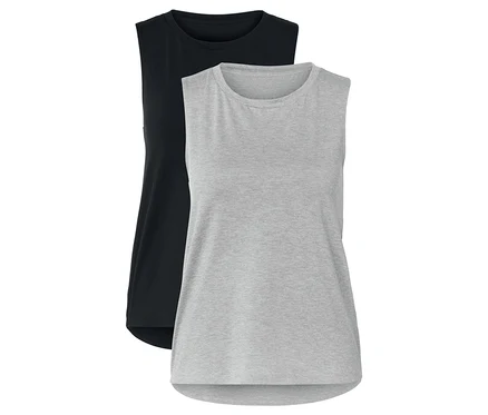 Zwei Tanktops, eines schwarz und eines grau, liegen nebeneinander.