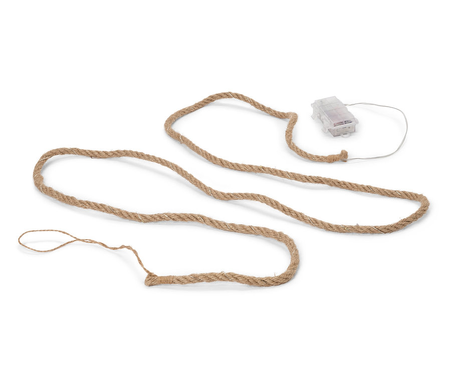 Ein beiges Seil liegt auf einem weißen Hintergrund. An einem Ende befindet sich ein durchsichtiges Batteriegehäuse mit einem weißen Kabel.