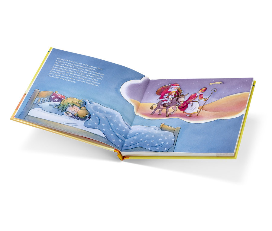 Eine Buchillustration zeigt ein schlafendes Mädchen im Bett mit einem Teddybären. In ihrem Traum sind der Weihnachtsmann auf einem Esel und der Nikolaus zu sehen.