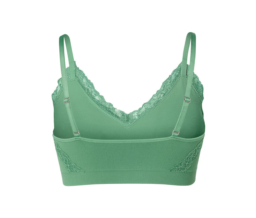 Detailansicht eines grünen Seamless-Bustiers mit Spitzendetail.