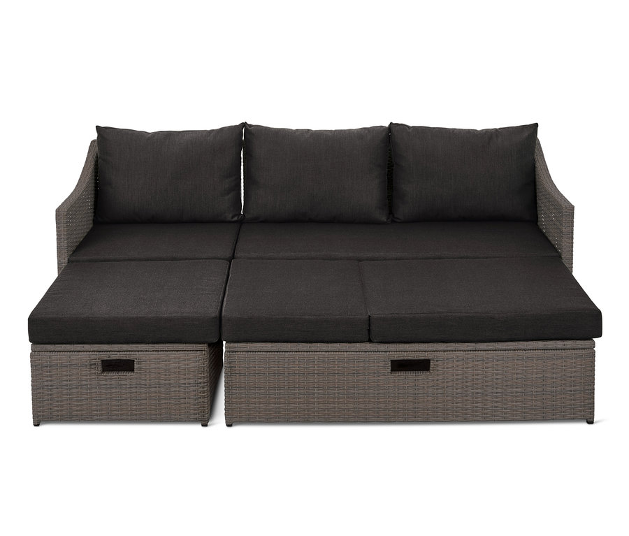 Auszieh-Schlafsofa »Thore« mit Stauraum und dunkelgrauen Kissen.