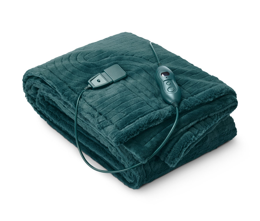 Gefaltete Heizdecke mit Bedienfeld.