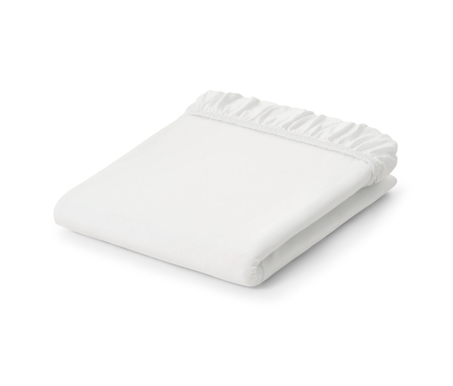 Gefaltetes weißes Jersey-Spannbettlaken.