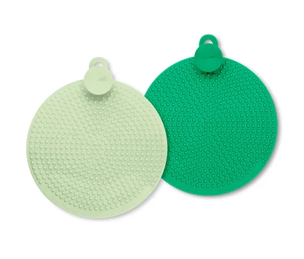 Zwei Silikon-Abwaschpads, hellgrün und grün.
