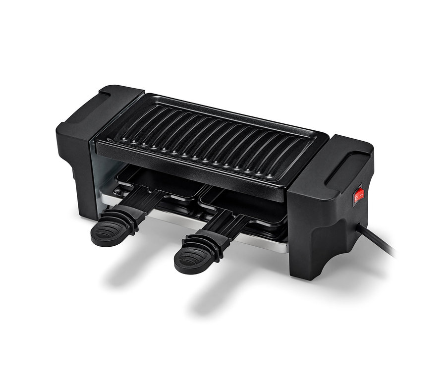 Schwarzer Raclette-Grill für 2 Personen mit Antihaftbeschichtung und zwei Pfännchen.