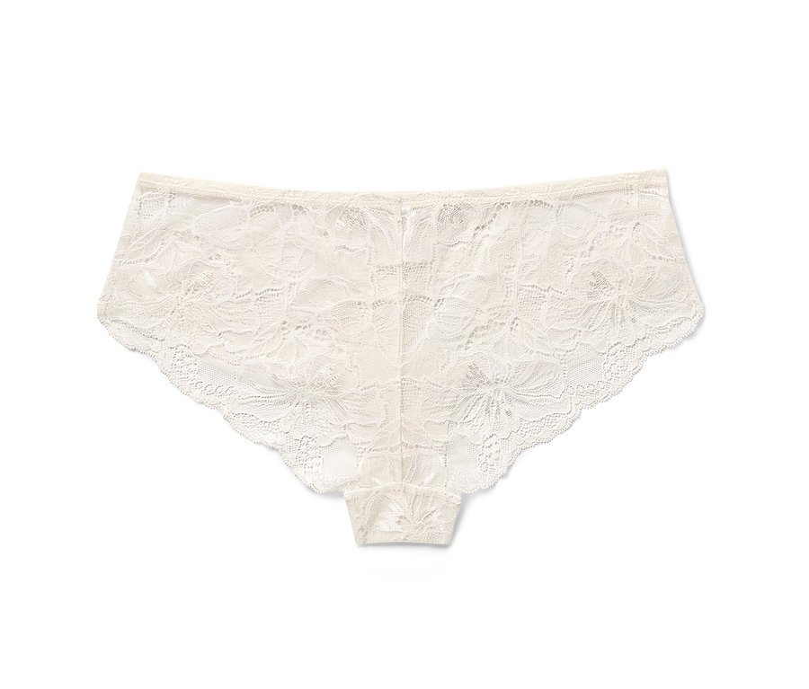 Nahaufnahme von weißen Spitzen-Hipster auf weißem Hintergrund.