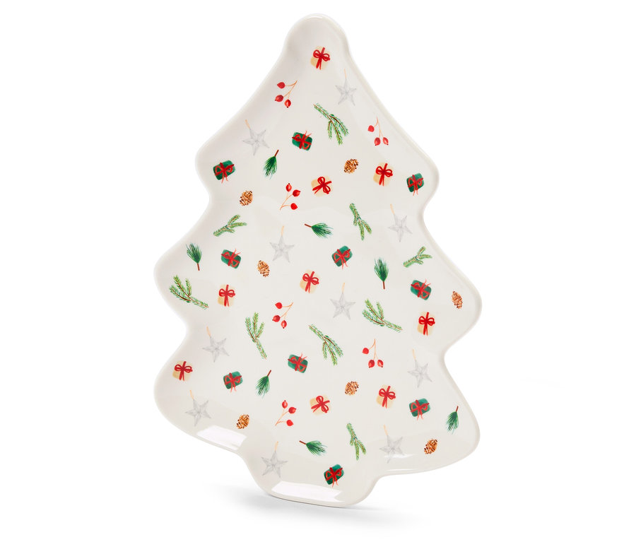 Weihnachtsbaumförmiger Teller mit Verzierungen.