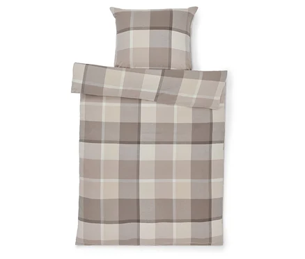 Bettbezug und Kissen mit Karomuster in Beige.