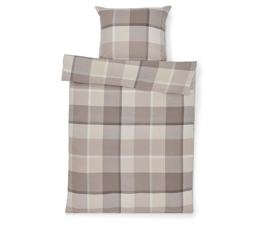 Bettbezug und Kissen mit Karomuster in Beige.