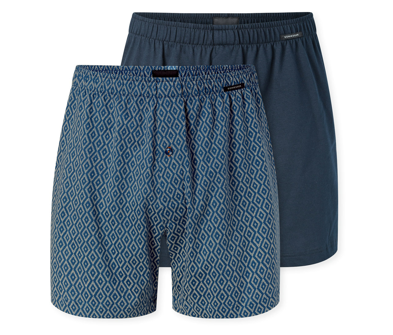Zwei SCHIESSER Jersey-Boxer; einer blau mit weißem Rautenmuster und Knopfleiste, der andere unifarben dunkelblau.