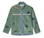Grüne Fleecejacke mit Reißverschluss und Dinosaurier-Muster, eingefasst mit hellblauem Stoff.