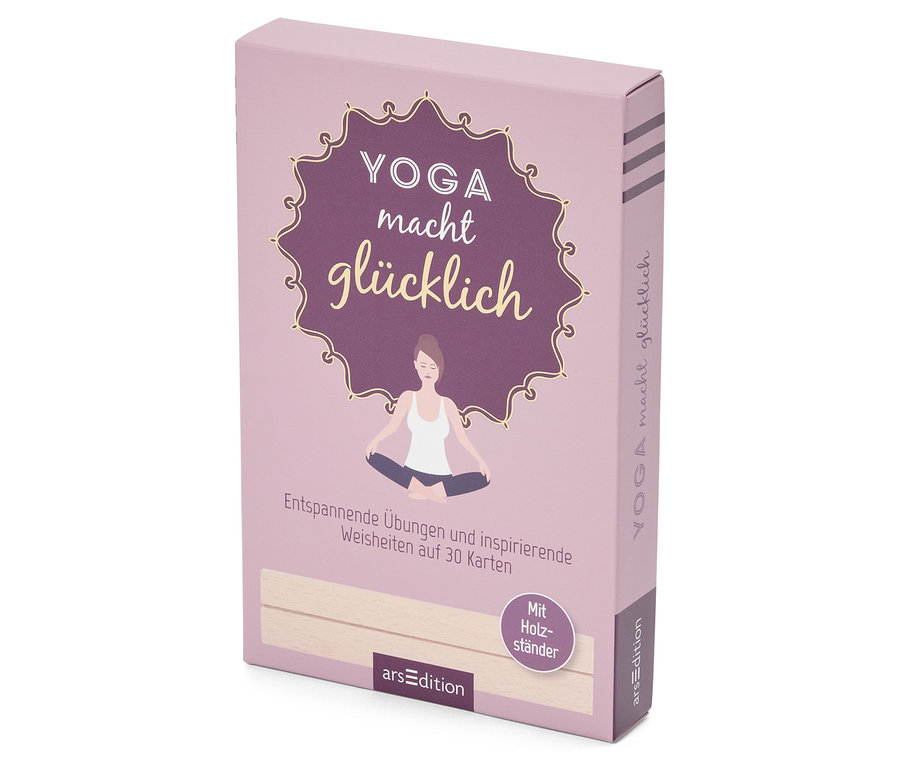 Nahaufnahme einer lila "Yoga macht glücklich" Kartenbox mit einer Frau in Yoga-Pose und einem Holzständer.
