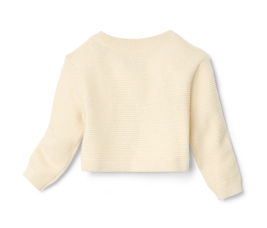 Baby-Strickbolero in Creme.
