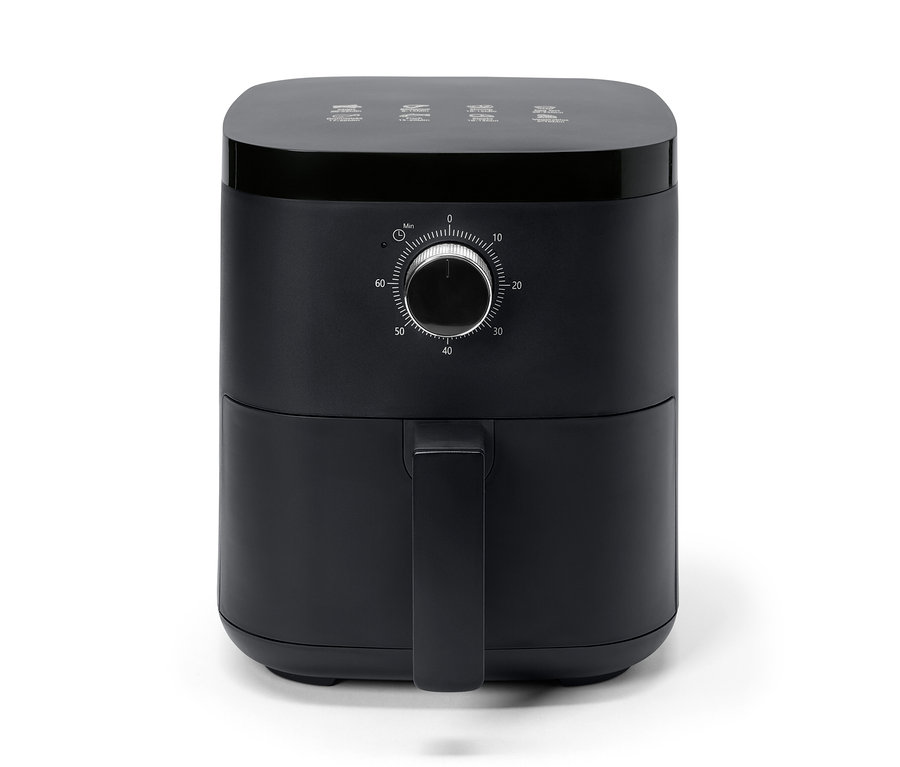 Eine schwarze Heißluft-Fritteuse mit Drehknopf für die Zeiteinstellung.
