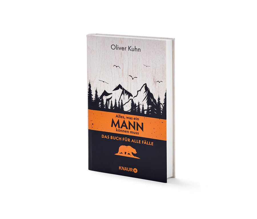 Das Buch "Alles, was ein Mann können muss" von Oliver Kuhn. Das Cover zeigt Berge, Wald und einen Bären.