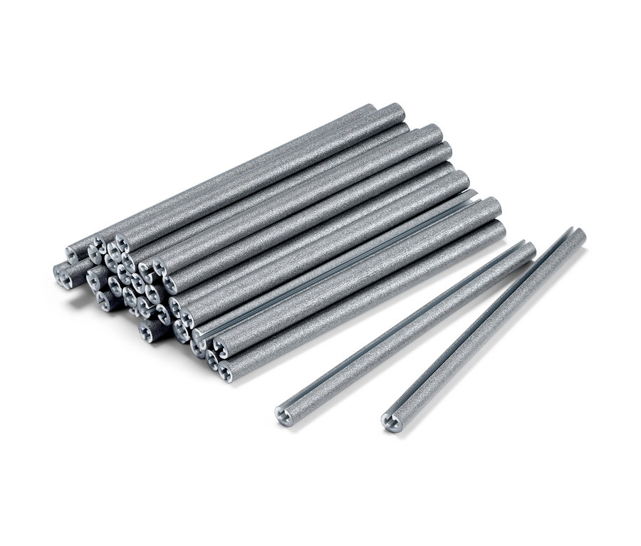 36 Speichen-Reflektoren liegen auf einem weißen Untergrund.