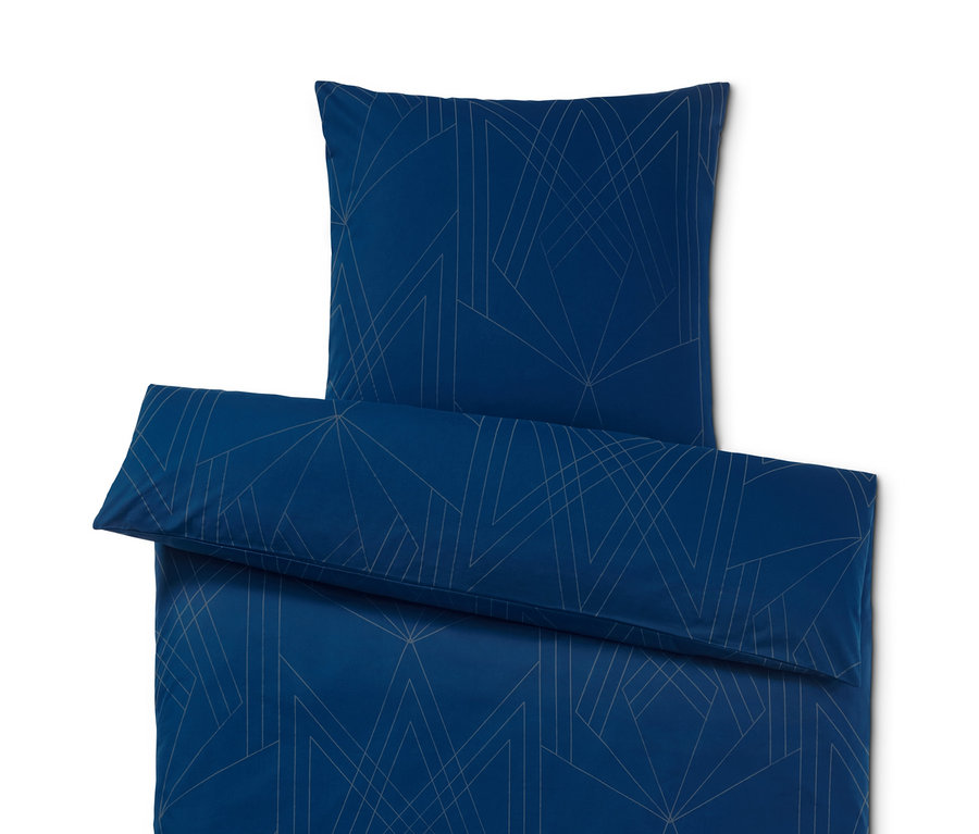 Dunkelblaue Renforcé-Bettwäsche mit geometrischem Muster.