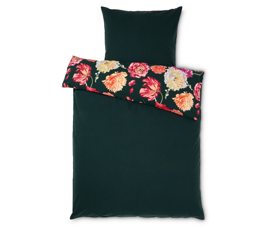 Dunkelgrüne Bettwäsche mit Blumenmuster.