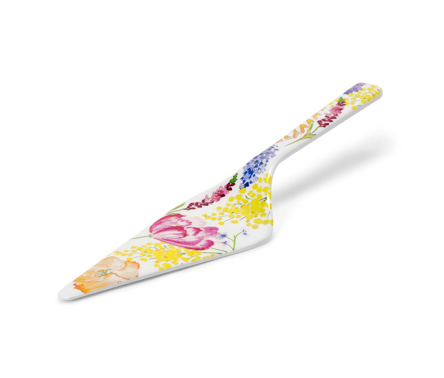Weißer Tortenheber mit Blumenmuster.