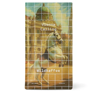 Eine Packung Wildkaffee Vienna Calling Espresso mit einem Bild eines weißen Pferdes und Wiener Architektur.