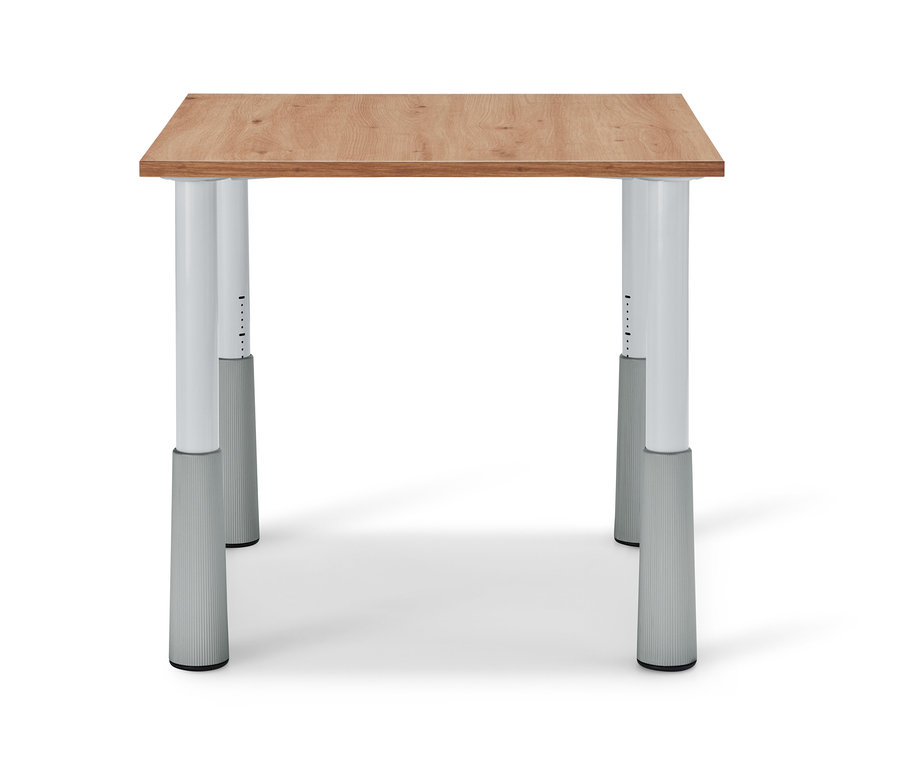 Detailansicht eines höhenverstellbaren Kindertisches mit einer Holzplatte und weißen Beinen.