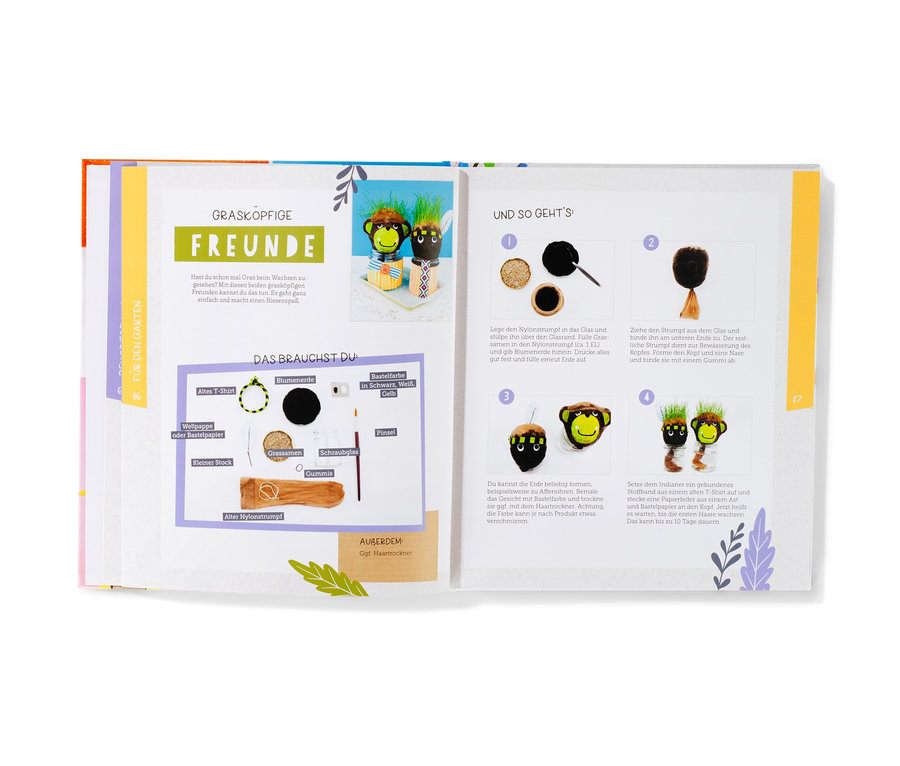 Aufgeschlagenes Buch mit Bastelanleitung für Figuren mit Grasfrisuren, mit dem Titel Buch »Meine nachhaltige Bastelwerkstatt«.