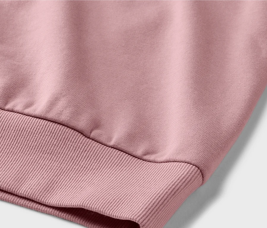 Detailaufnahme eines Kinder-Sweatshirts mit angerauter Innenseite.