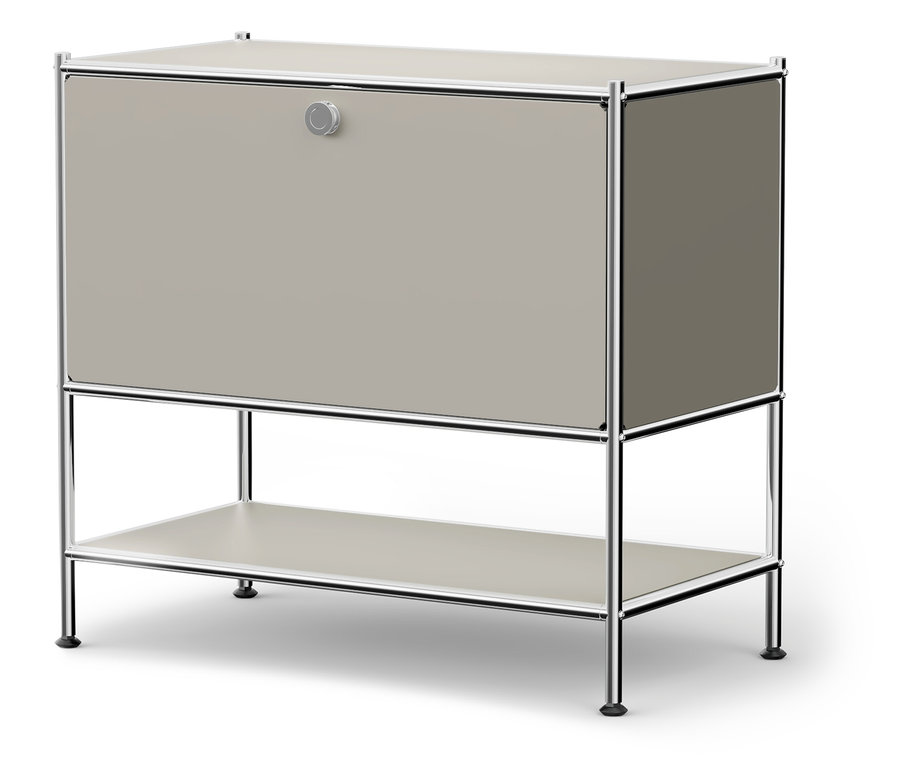 Grauer Schrank mit verchromtem Rahmen und rundem Knopf.