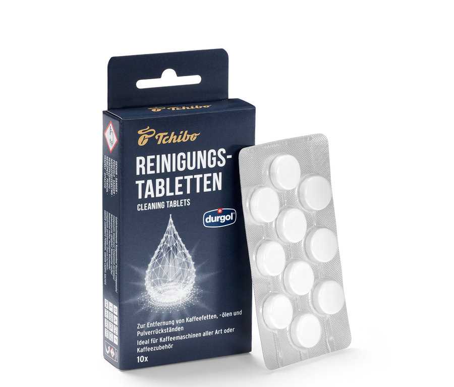 Eine Packung durgol® Reinigungstabletten für Kaffeeöle und eine Blisterpackung mit Tabletten.