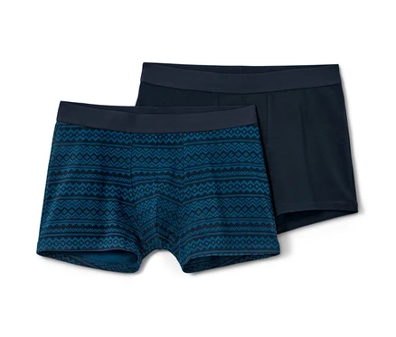 Zwei Slipboxer, eine mit Norwegermuster, die andere dunkelblau.