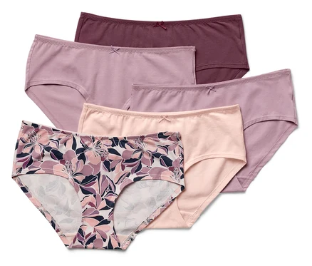 Sechs Slips in verschiedenen Farben und Mustern. Einer ist mit Blumenmuster, einer ist aprikosenfarben, drei sind lila und einer ist dunkelviolett.