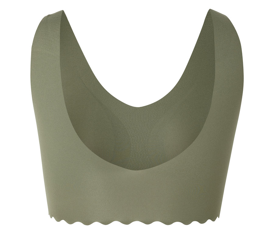 Ein olivgrünes, trägerloses Bustier mit gewelltem Saum vor einem weißen Hintergrund.